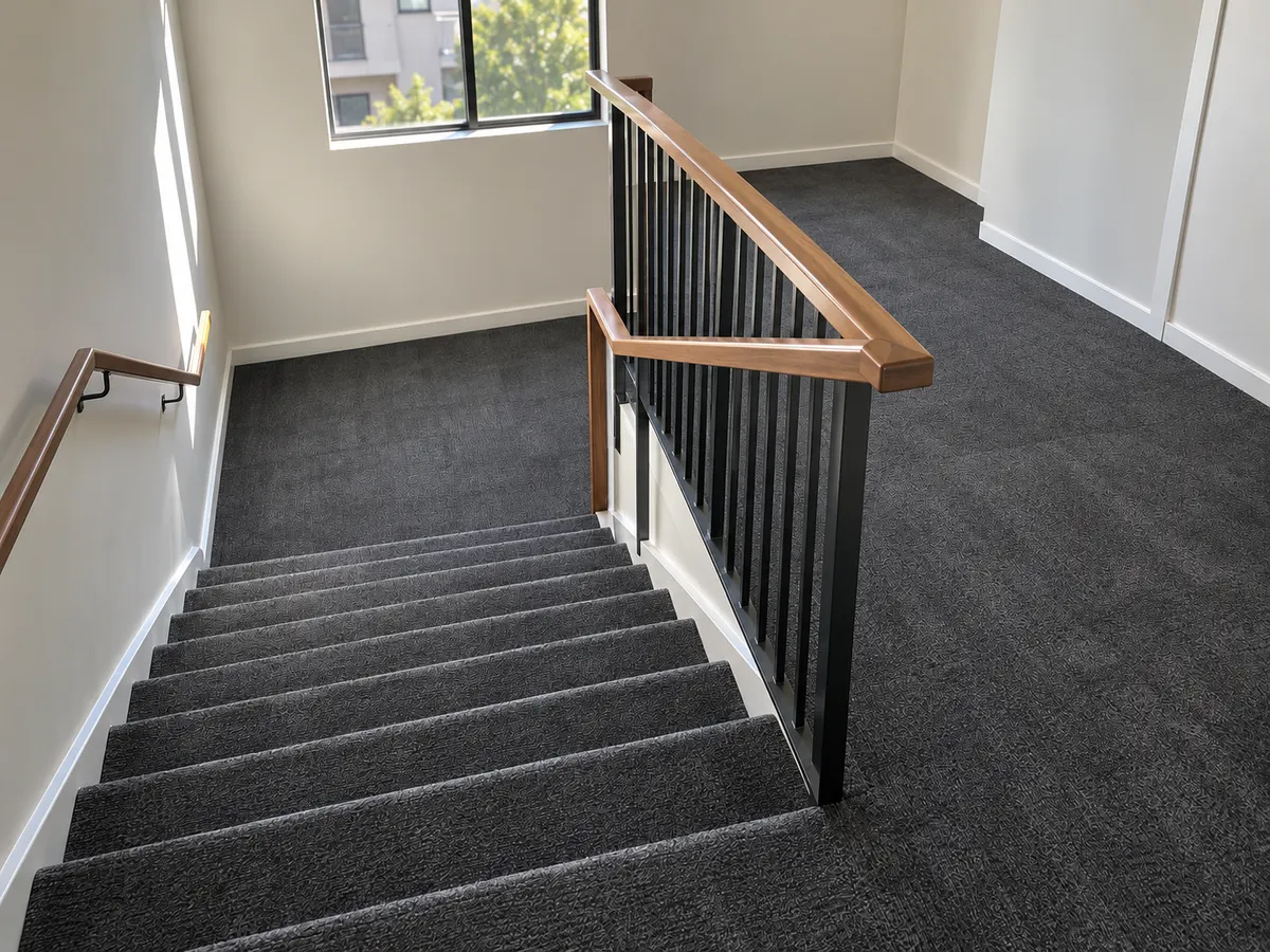 Freshly cleaned carpeted stairs and landing